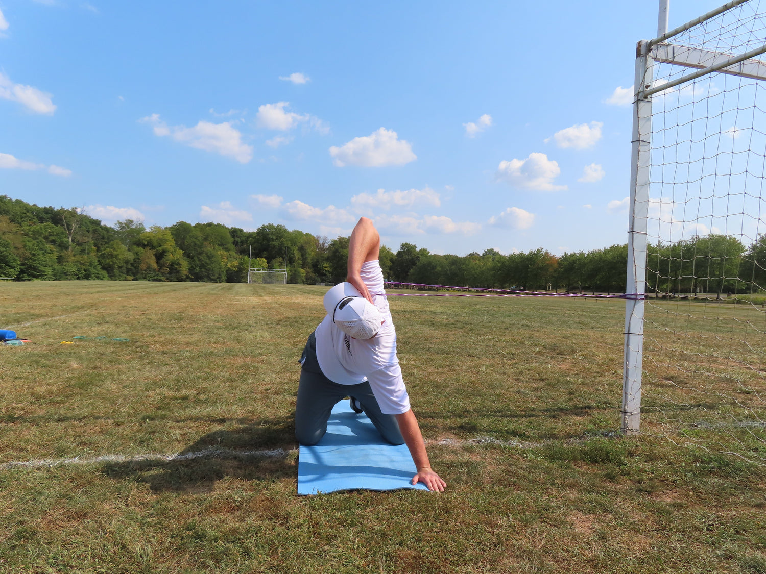 Golfer performing the best resistance band exercises to increase club head speed
