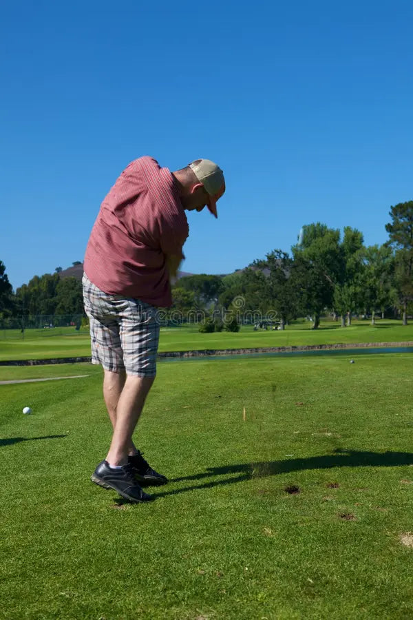 Practicing golf swing speed training with proper form to increase clubhead speed and driving distance.